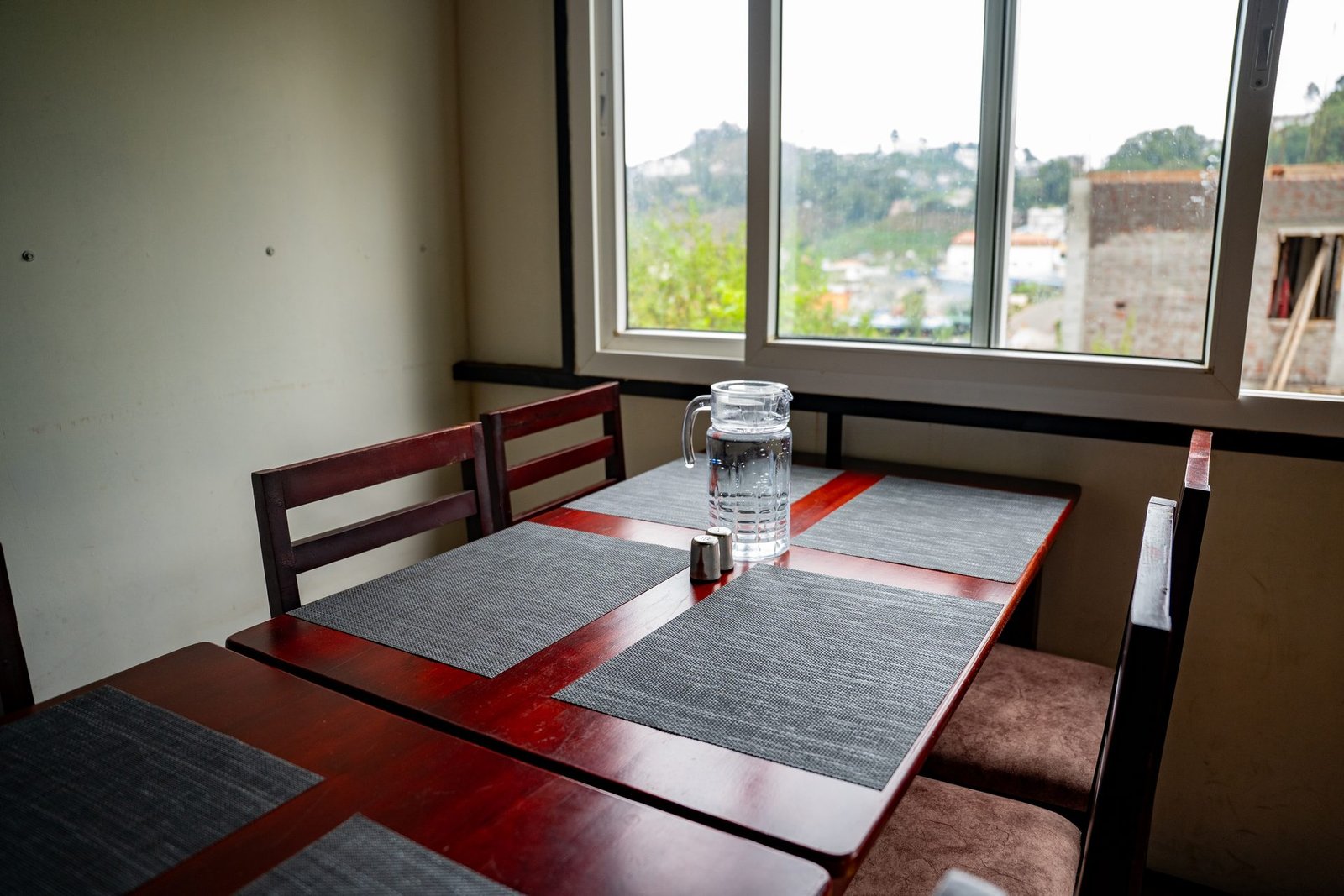 Dining area with window view, Rio Grande Retreat Kodaikanal